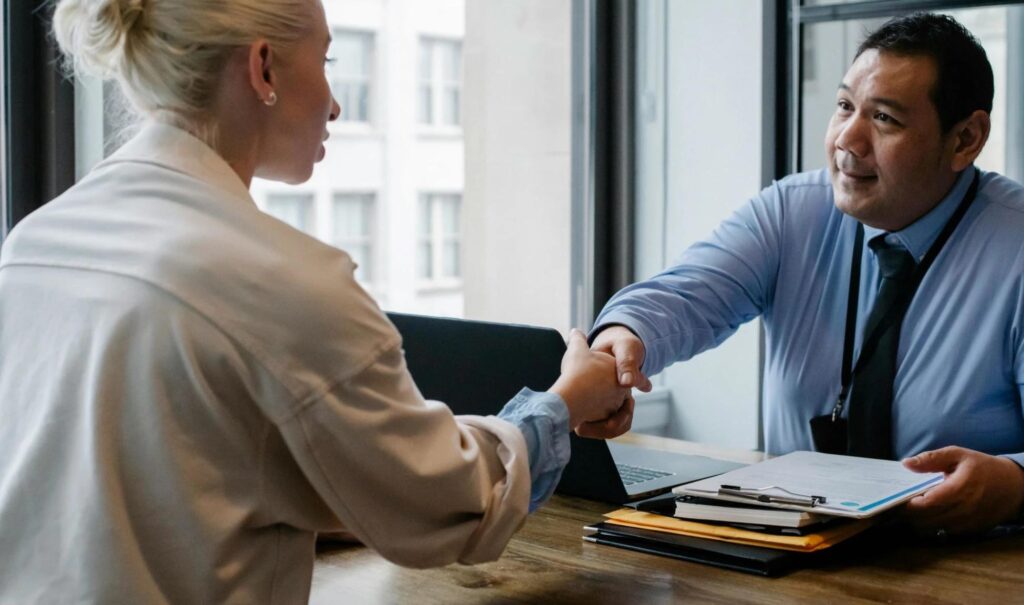 Business owner consulting an accounts receivable management expert to improve cash flow and recover overdue payments in Pakistan.